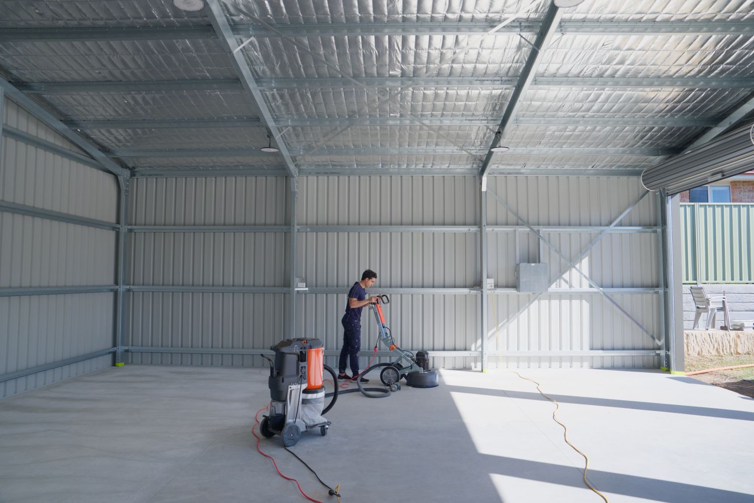 Diamond grinding a slab before the flake floor goes down