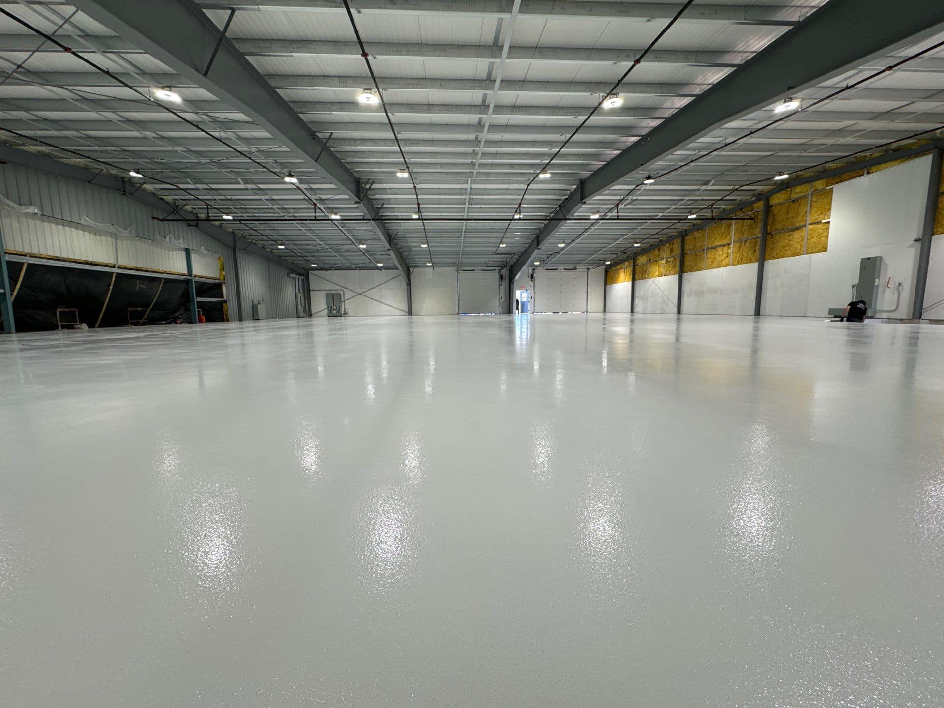 Epoxy coated warehouse floor in North West Sydney